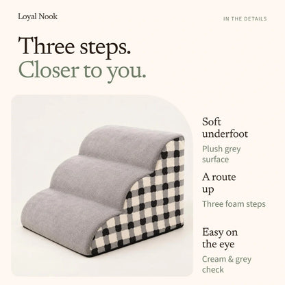 Grey plush surface, three foam steps, and cream and grey checked sides