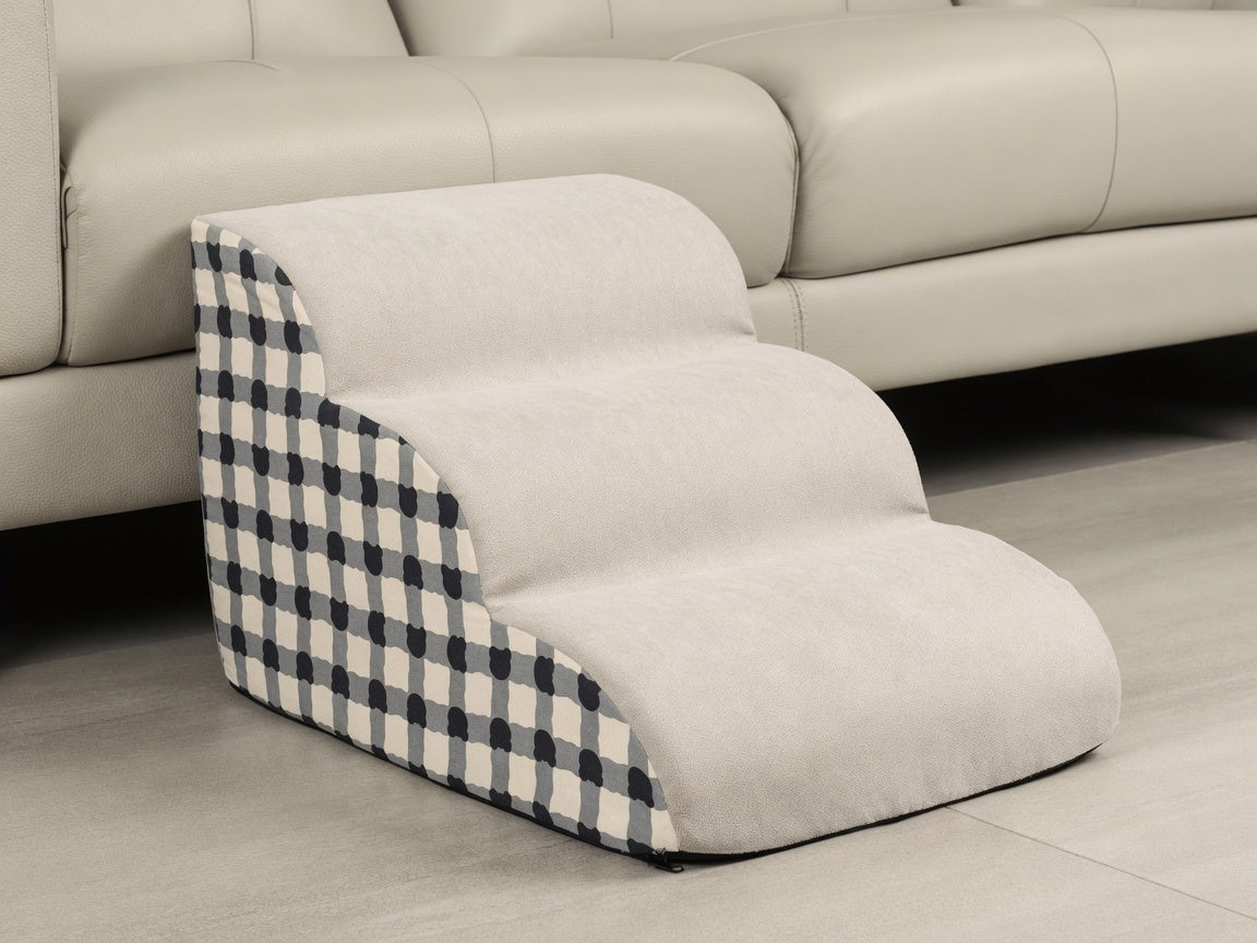 Cream-and-charcoal check stairs beside a sofa, ready to measure the seat